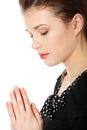 Young caucasian woman praying Royalty Free Stock Photo