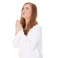 Young caucasian woman praying Royalty Free Stock Photo