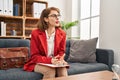 Young caucasian woman psychologist speaking at psychology center Royalty Free Stock Photo