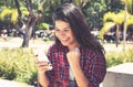 Young caucasian woman receiving good news on phone Royalty Free Stock Photo