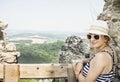 Young caucasian woman in a sailor outfit is posing on the ruins Royalty Free Stock Photo