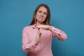Young caucasian woman showing a timeout gesture Royalty Free Stock Photo