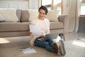 Young woman studying on laptop at home Royalty Free Stock Photo