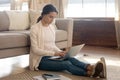 Young Caucasian woman studying on laptop at home Royalty Free Stock Photo