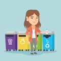 Young caucasian woman throwing out plastic bottle. Royalty Free Stock Photo