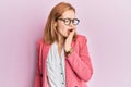 Young caucasian woman wearing business style and glasses bored yawning tired covering mouth with hand Royalty Free Stock Photo