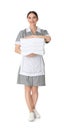 Young chambermaid holding stack of fresh towels on background Royalty Free Stock Photo