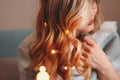 Young charming blonde woman in glasses with lights in her hair, romantic atmospheric photo about dreams Royalty Free Stock Photo