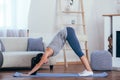 Young cheerful attractive woman practicing yoga Royalty Free Stock Photo