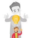 Businessman giving idea light bulb to his partner. Royalty Free Stock Photo