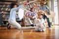 A young cheerful family enjoying a playtime at home together. Family, together, love, playtime