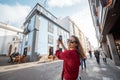 Woman traveling the old town in La Laguna city on Tenerife island, Spain