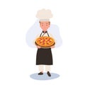 Young Chef Cooking Delicious Homemade Pizza. Child Chef in Chef Hat Serving Pizza Royalty Free Stock Photo