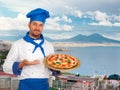 Young chef with neapolitan pizza margherita