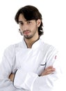 Young chef posing with his arms crossed