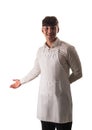 Young chef or waiter posing, wearing white apron and white shirt isolated Royalty Free Stock Photo