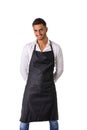 Young chef or waiter wearing black apron isolated Royalty Free Stock Photo