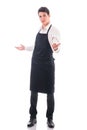 Young chef or waiter wearing black apron isolated Royalty Free Stock Photo