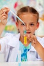 Young chemist - little girl in science class Royalty Free Stock Photo