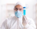 Young chemist student working in lab on chemicals Royalty Free Stock Photo