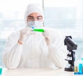 Young chemist student working in lab on chemicals Royalty Free Stock Photo