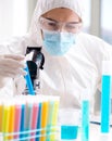 Young chemist student working in lab on chemicals Royalty Free Stock Photo