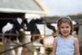 Young Child with Baby Cows