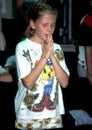 A young child in deep prayer