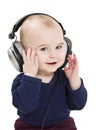 Young child with ear-phones listening to music Royalty Free Stock Photo