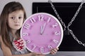 Young child, girl, monitor closed with chain lock, clock