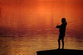 Young Child Kid Person Fishing in Lake or River Sunset