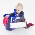 Young child with painters equipment