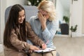 Young child psychologist working with little girl Royalty Free Stock Photo