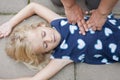 Young child receiving first aid