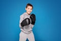 Young child sportsman in boxing gloves