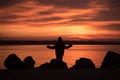 Young child standing overlooking a marine sunset Royalty Free Stock Photo