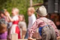 Young child in typical costume during an autumn local celebration in Val di Funes South Tyrol