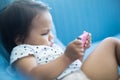 Young child watch tv on a smartphone Royalty Free Stock Photo