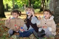 Young children blowing bubbles Royalty Free Stock Photo