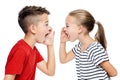 Young children facing eachother and shouting. Speech therapy concept over white background. Royalty Free Stock Photo