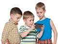 Young children plaing with a new gadget