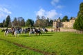 Young children sat on horses in an English countryside setting, waiting for the fox hunt to begin Royalty Free Stock Photo