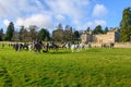 Young children sat on horses in an English countryside setting, waiting for the fox hunt to begin Royalty Free Stock Photo