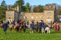 Young children sat on horses in an English countryside setting, waiting for the fox hunt to begin Royalty Free Stock Photo