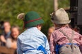 Young children in typical costume during an autumn local celebration in Val di Funes South Tyrol