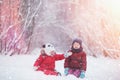 Young children are walking in the winter park. Winte Royalty Free Stock Photo