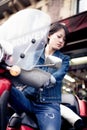 Young Chinese Female On Scooter Royalty Free Stock Photo