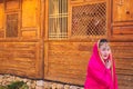 Young chinese girl with an ancient dress in the streets of Lijiang Yunnan, China Royalty Free Stock Photo