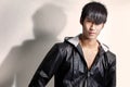 Young, chinese male model in black jacket Royalty Free Stock Photo