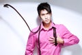 Young Chinese Metrosexual man in pink shirt